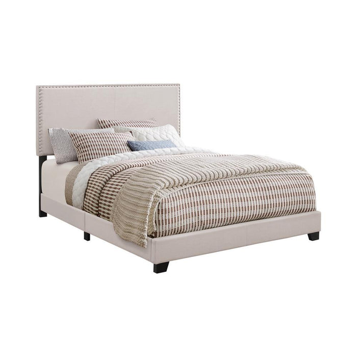 Boyd Eastern King Upholstered Bed with Nailhead Trim Ivory