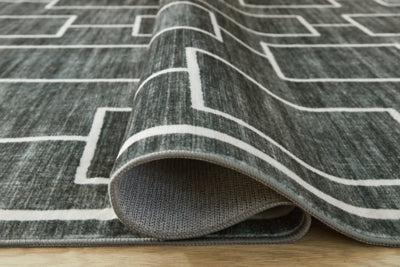 Elderland Washable 5' x 7' Area Rug - Sims Furniture