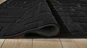 Gibbswell Washable 5' x 7' Area Rug - Sims Furniture